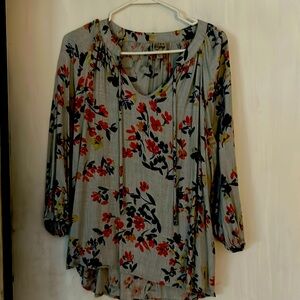 This blouse is  very comfortable and flowery